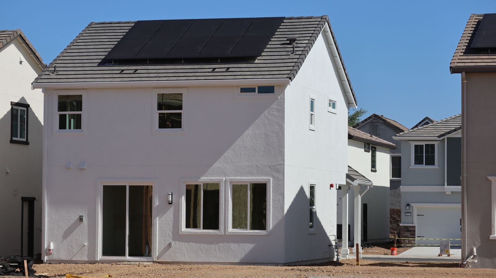 Modern sustainable house with solar panels, the residential scale a LEED AP Homes serves